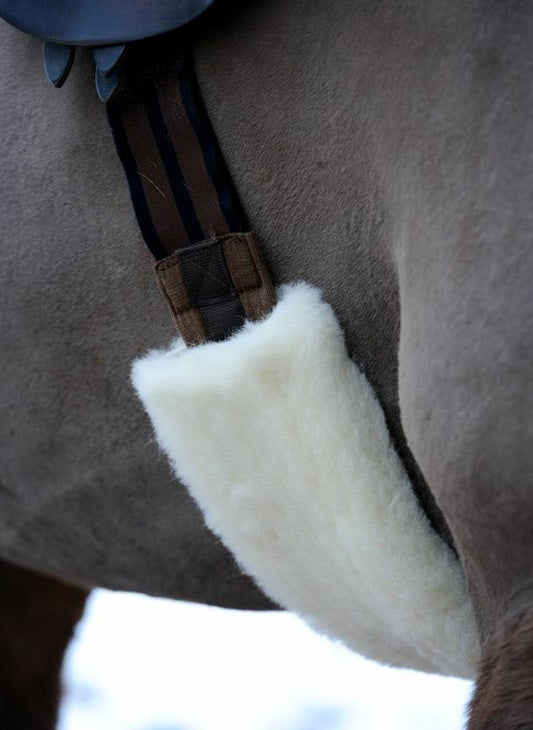 British wool girth sleeve in natural colour, shown on horse.